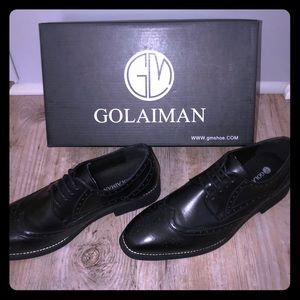 GOLAIMAN Men’s black leather Oxford dress shoes.